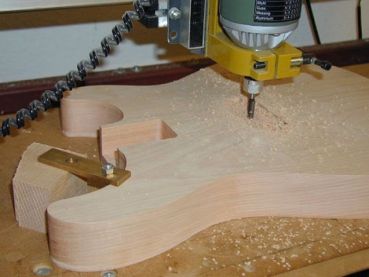 Milling, shaping and sanding of an ordered body blank